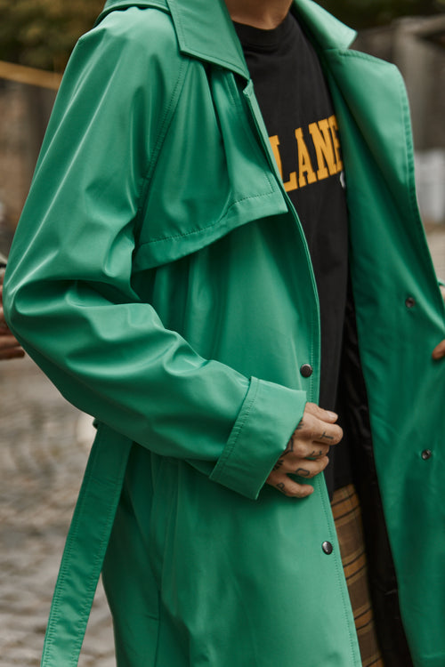 Green hooded trench coat