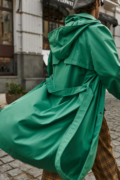 Green hooded trench coat